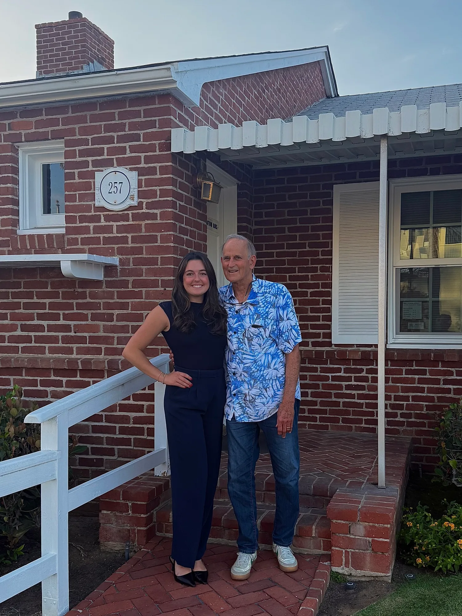 Dr. Madison Brown with Dr. Bill Crafton outside the San Diego Bay Dental office