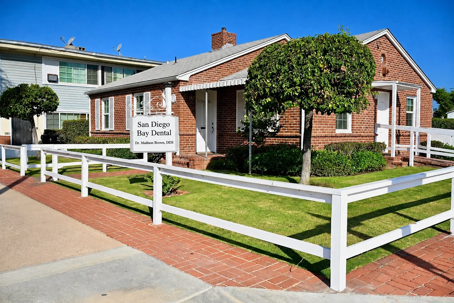 The San Diego Bay Dental office exterior and practice sign in Chula Vista