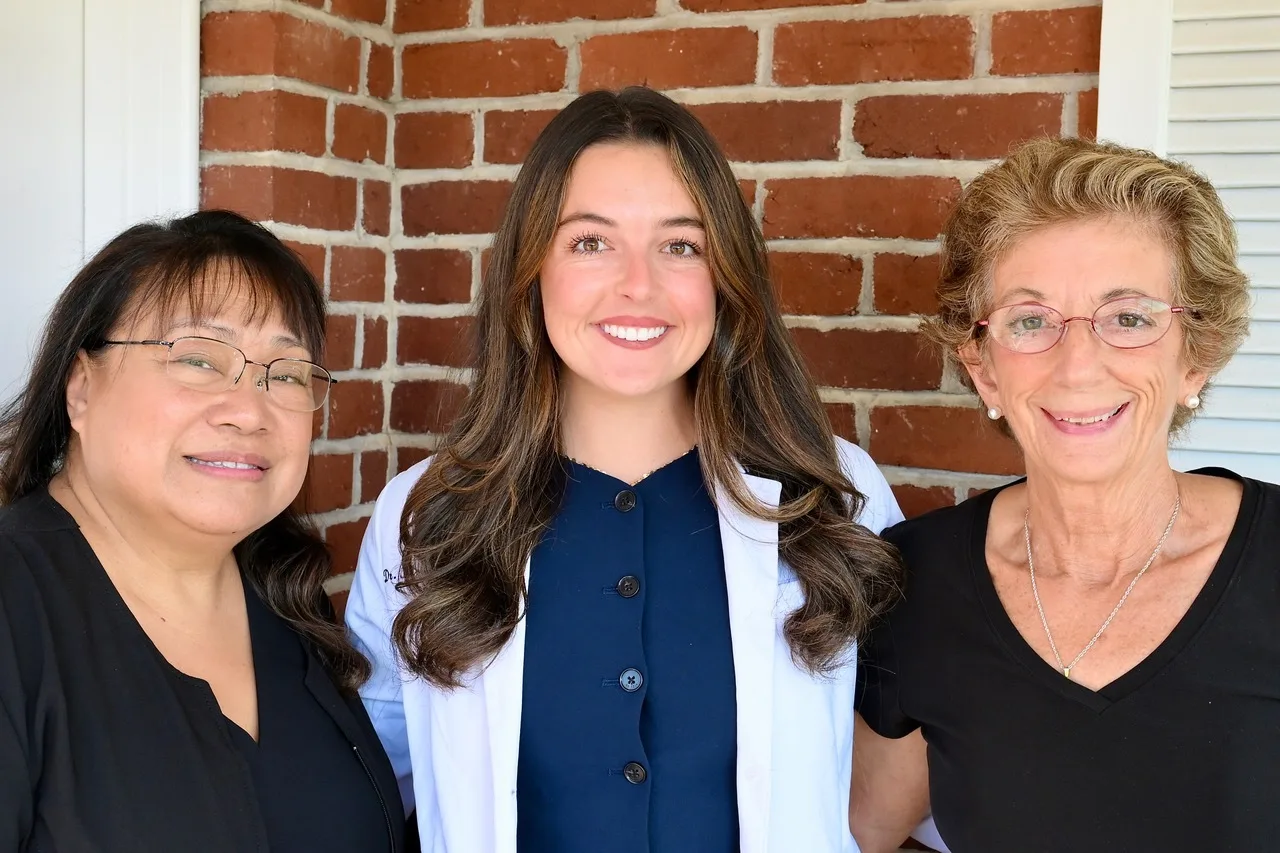 Dr. Madison Brown with members of the San Diego Bay Dental team